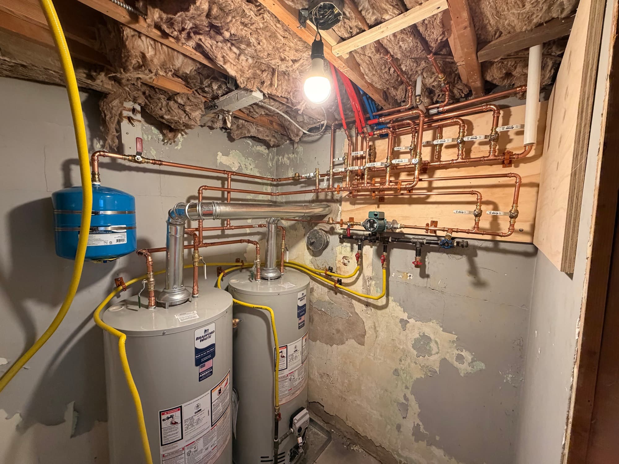 Copper water heater piping and manifold installation
